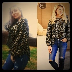 Animal print sweater size medium/large